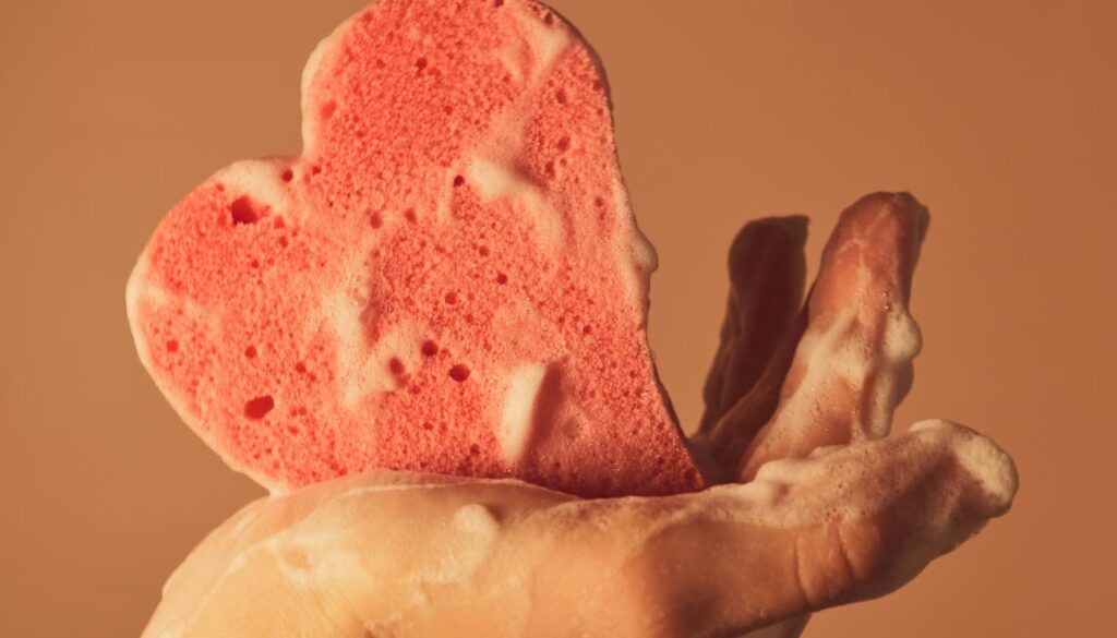 heart shaped exfoliating scrub in shower