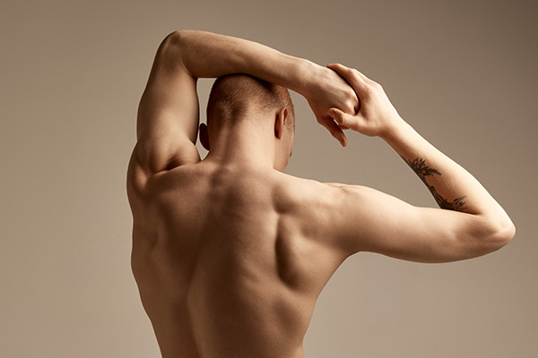 male with smooth back and body from waxing